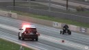 Police Dodge Charger vs Ford Mustang GT drag race on Wheels