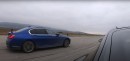 Porsche Panamera Turbo S vs BMW 750i drag race