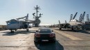 Porsche Taycan on the deck of the USS Hornet