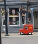 Postman Pat replica becomes local celebrity in UK town