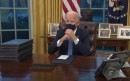 Joe Biden in the Oval Office on Inauguration day, wearing a Rolex Datejust