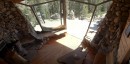 Pro snowboarder builds epic tiny rock cabin