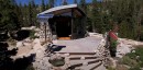 Pro snowboarder builds epic tiny rock cabin