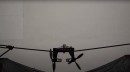 Midair-Reconfigurable Quadcopter