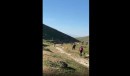 Rider getting hit by bull during Rock Cobbler bike event