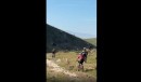 Rider getting hit by bull during Rock Cobbler bike event