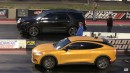Ford Mustang GT/CS vs Mach-E drag race on Wheels