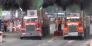 Peterbilt 389 semi takes on a Kenworth T800 in a straight line