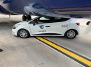 Renault Clio touches Boeing 737 in an unlikely manner