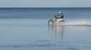 Robbie Maddison riding a KTM on the open sea