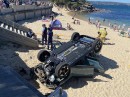 Kia Seltos drops down on the Balmoral beach while driver was trying to exit a parking lot