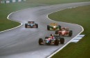 Rubens Barrichello (Jordan 193 Hart) followed by Jean Alesi (Ferrari F93A), Michael Schumacher (Benetton B193B Ford) and Ukyo Katayama (Tyrrell 020C Yamaha) in the 1993 European GP, at Donington Park