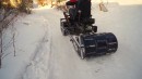 Snowroller with drum barrels