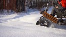 Snowroller with drum barrels