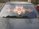 Russian cars celebrating Victory Day: rear window sticker