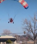 Airborne Santa in paraplane stuck in live power wires in California, U.S.