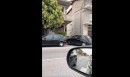 Lancia Ypsilon Driver Attempting to Enter a Driveway