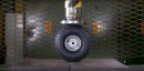 Tire vs. hydraulic press