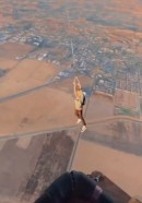 Skydiver jumps from hot air balloon over California, swings on rope swing