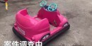 50-year-old woman takes a bumper car to the busy streets of China