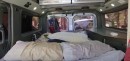 Family of six travels in a Nissan NV2500 turned camper van