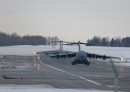 C-17 Globemaster III taking off from runway in Alaska