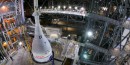Orion spacecraft getting stacked on top of the fully assembled Space Launch System (SLS) rocket at NASA’s Kennedy Space Center