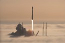 SpaceX Falcon 9 rocket surrounded by fog at Cape Canaveral Space Force Station