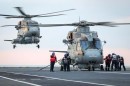 Merlin helicopters touchdown on HMS Prince of Wales