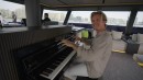 The Self-playing Piano on the lounge of the Sunreef 80 Eco Sailing Yacht