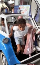 Swizz Beatz and His Kids at BMW Factory