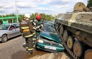 Out of control tank crushes VW Polo at intersection in Belarus