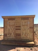 Covered Wagon Glamping Outhouse