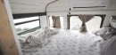 Woman converts short school bus into a cozy home on wheels