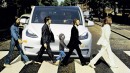 Beatles crossing the street in front of Tesla meme