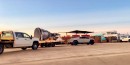 Tesla Cybertruck hauling a Raptor engine