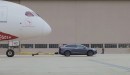 Tesla Model X acting as a pushback tractor