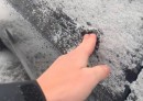 Tesla Model 3 owner finds creative ways to open the car after the door handle freeze