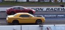 Tesla Model S P100D Drag Races Dodge Challenger SRT8 Yellow Jacket