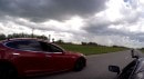 Tesla Model S P100D vs 1,000 HP Toyota Supra Drag Race