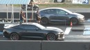 Tesla Model X vs Chevy Camaro SS drag race on Wheels Plus