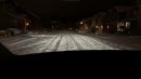 Tesla Model Y almost crashes down a snowy street