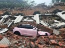 Pink Tesla Model Y almost intact after wall collapsed in China