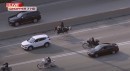 Dreadhead Cowboy with his motorcycle convoy on the Dan Ryan Expressway in Chicago