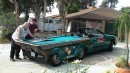 The Pool Table Car is a Chevy Monte Carlo that doubles as a pool table able to do 100 mph