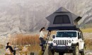 The Air Cruiser rooftop tent by Cinch and Wild Land is self-assembling, ultra-light, durable, four-season, and spacious