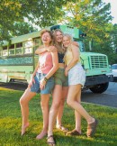 This skoolie motorhome came to be when three young women learned they were dating the same man and became friends