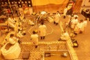 Engineers at JPL practice with a full-size replica of InSight