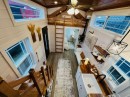 The Cottage tiny house with two lofts and main-floor bedroom