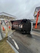 Mazda CX-5 flipped over at the entrance of a drive-thru